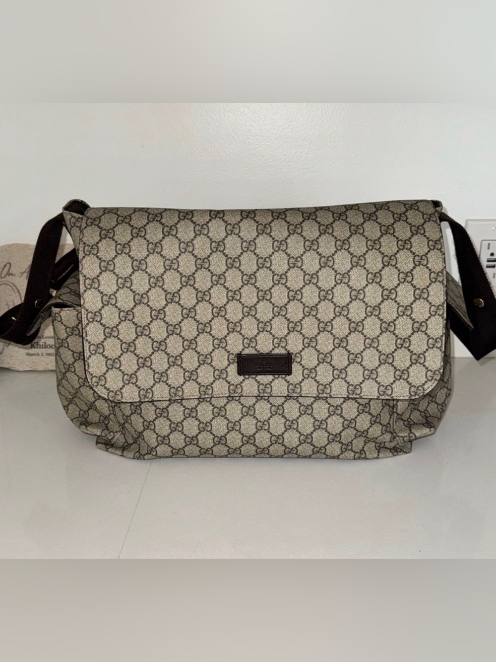Guccis diaper bag